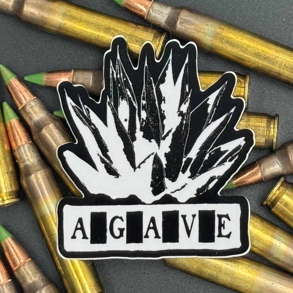 Sticker of Agave Logo in black and white on a bed of ammo