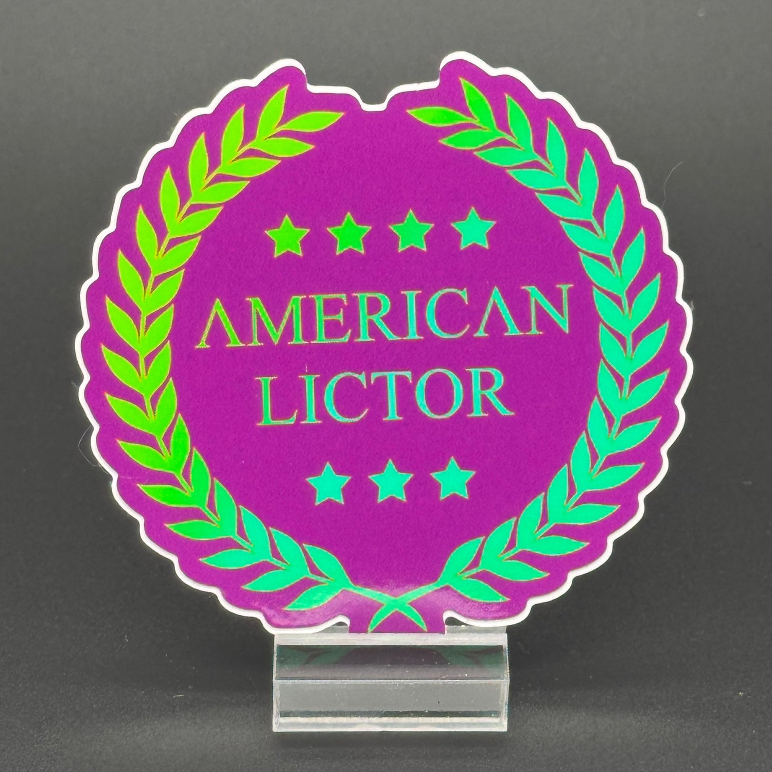 Sticker of the American Lictor Logo in Purple with green chromatic coloring