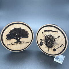 Two circular wooden coasters with the American Lictor 'New Appeal' and '3S' Designs