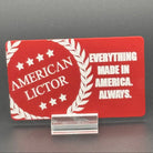 A red metal giftcard with the American Lictor Logo and Slogan " Everything Made in America. Always." 