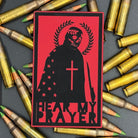 A red leatherette patch with a man with a skeleton mask draped in the American Flag with a Laurel Halo and cross and the text 'Hear my Prayer' on a bed of ammo
