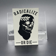 A leatherette patch of a worn ski mask on a skull with a laurel crown and the text "Radicalize or Die"