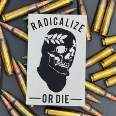 A leatherette patch of a worn ski mask on a skull with a laurel crown and the text "Radicalize or Die" on a bed of ammo