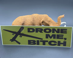 A bumper sticker in OD green with a reaper drone and the text "Drone Me, Bitch" posed with a Mastodon