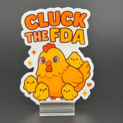 Sticker of a cute chicken with chicks saying "Cluck the FDA"