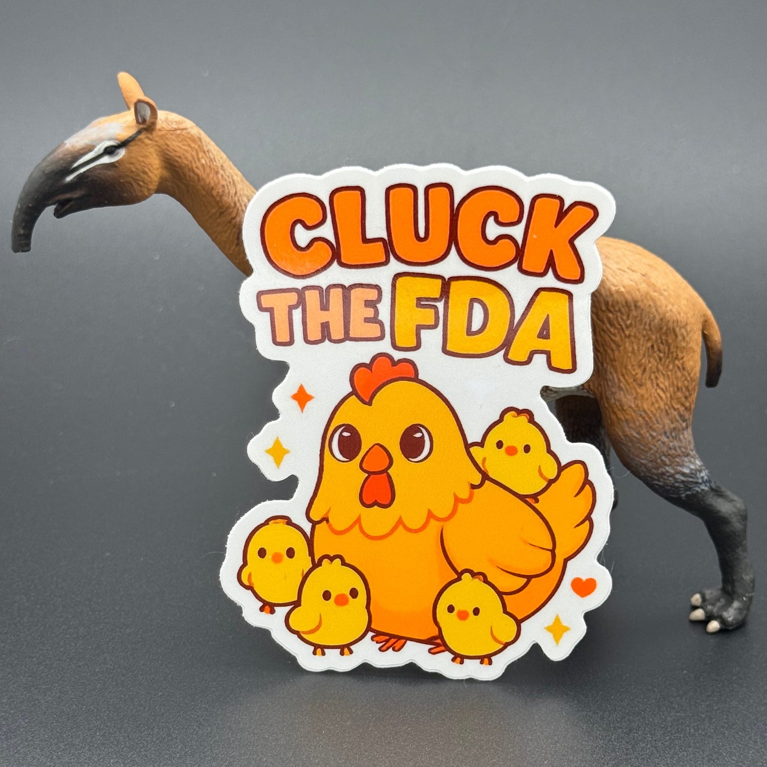 Sticker of a cute chicken with chicks saying 