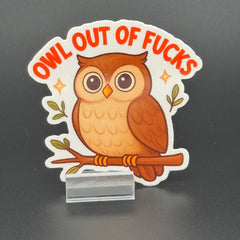 Sticker of a cute owl on a branch saying "Owl out of fucks"