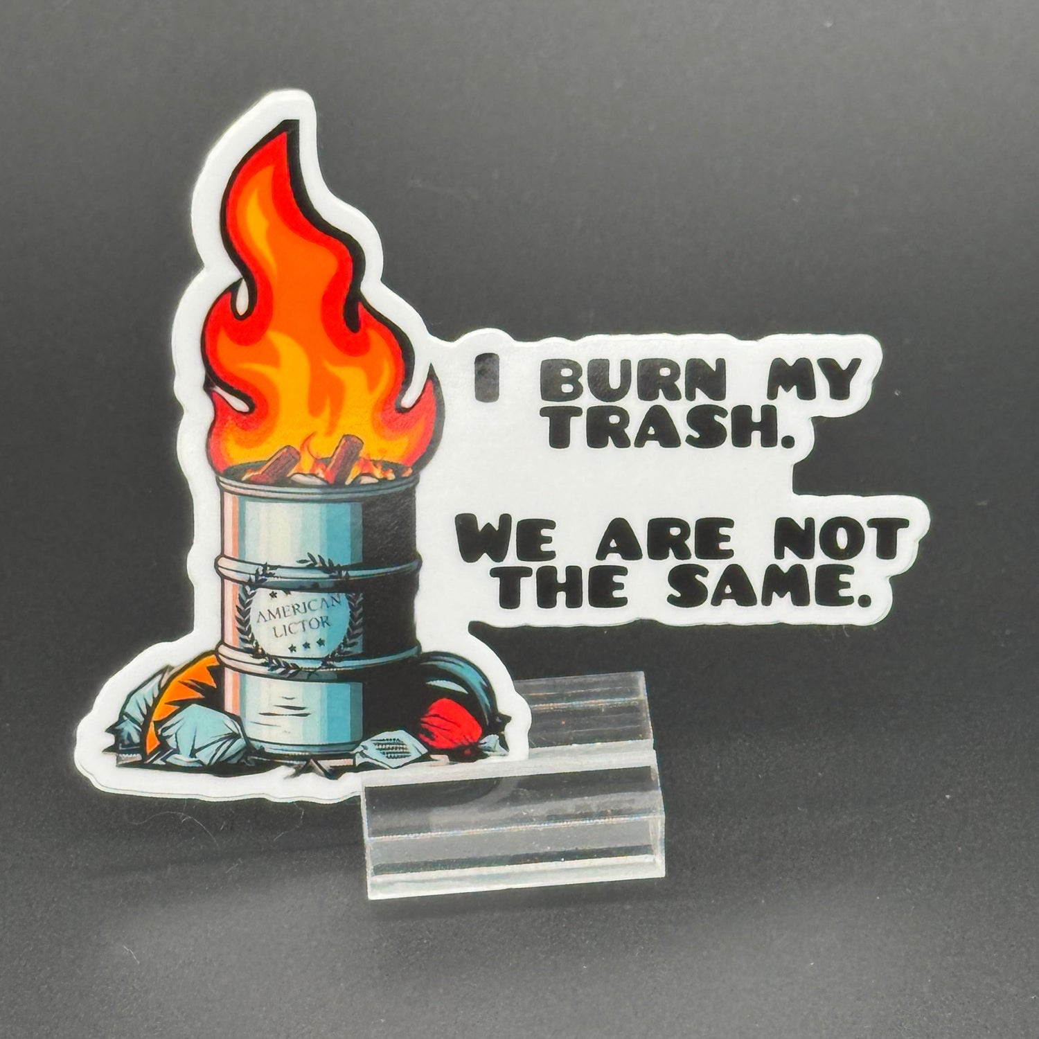 Sticker of an oil drum fire with the American Lictor Logo and the text 