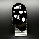 Sticker of a black ski mask with the text 'Ride or Die'