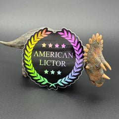 Sticker of the American Lictor Logo in black with chromatic coloring posing with a dinosaur