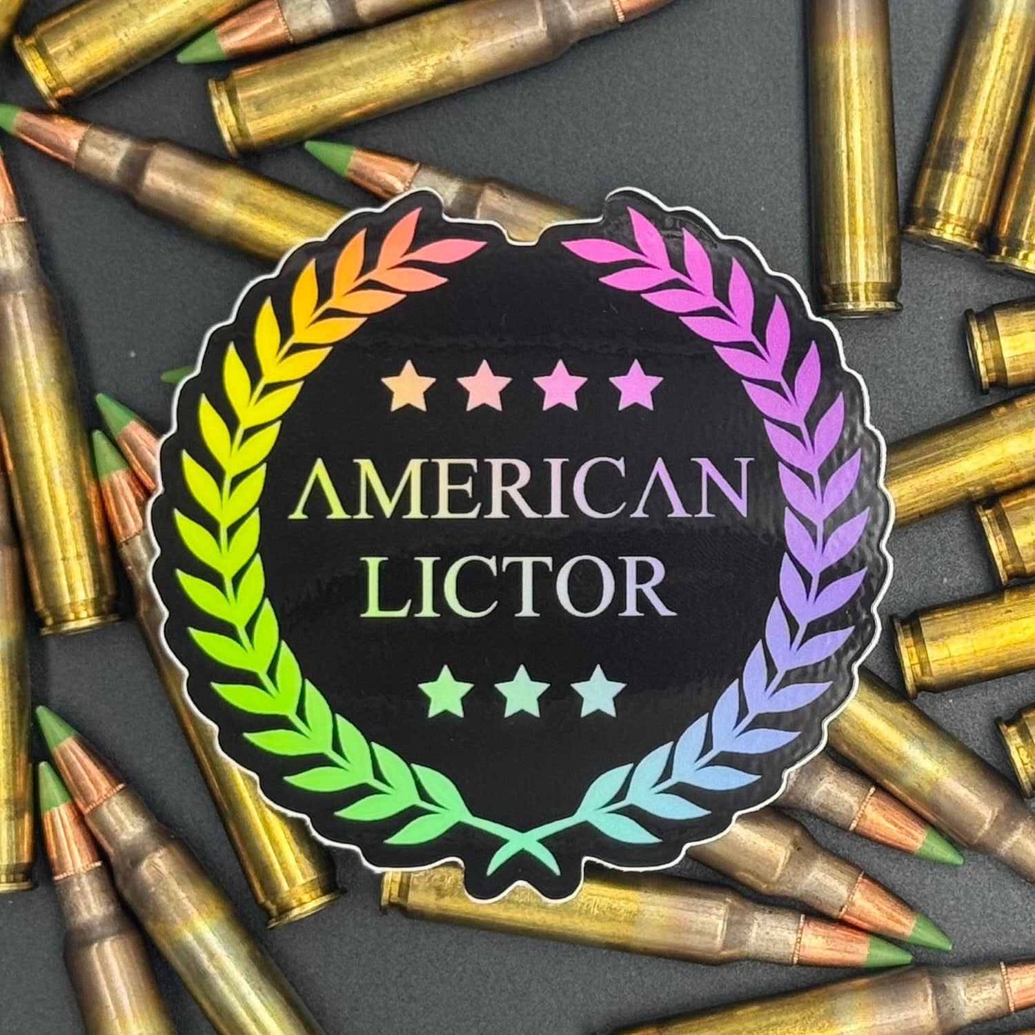 Sticker of the American Lictor Logo in black with chromatic coloring on a bed of ammo