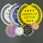 Various colors and sizes of the standard American Lictor logo stickers