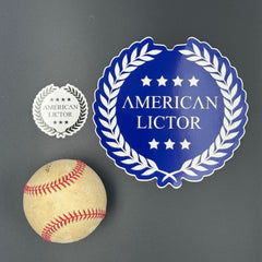 Sticker of an XL American Lictor Logo in navy pictured with a baseball for scale