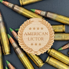 Wood Sticker of the American Lictor Logo on a bed of ammo