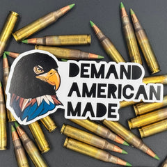 Sticker of an Eagle wearing a ski mask with the text 'Demand American Made' on a bed of ammo
