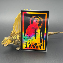 Chromatic sticker of a man draped in the American Flag with the text 'Hear my Prayer' posing with a dinosaur