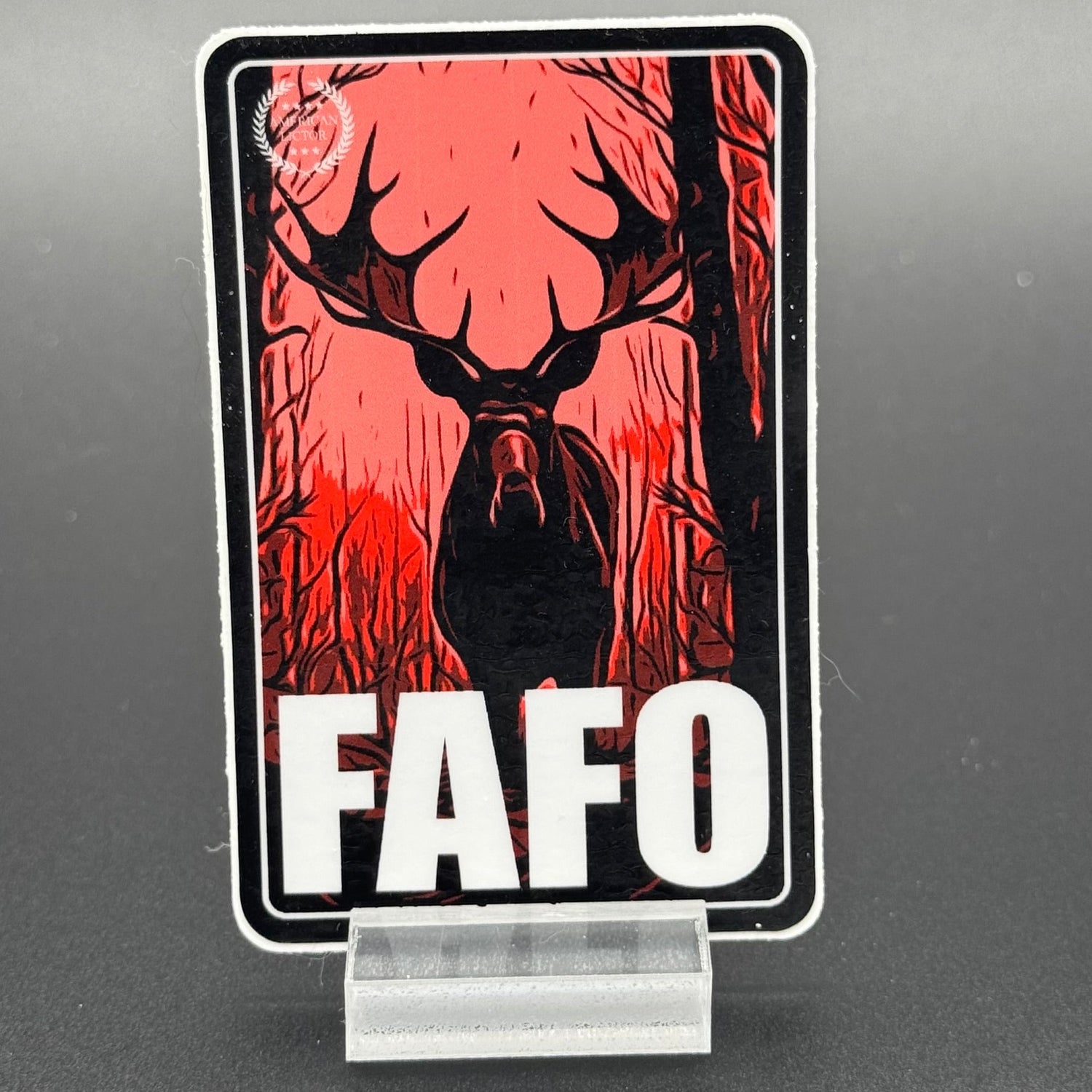 Black, red Sand white sticker of a Moose with the text 'FAFO'