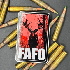 Black, red Sand white sticker of a Moose with the text 'FAFO' on a bed of ammo